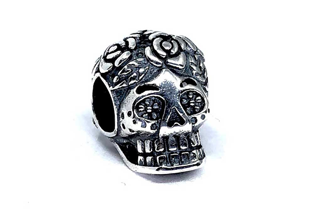 charm de plata con forma de catrina